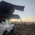 Roof Space rooftop tent with set up sunshade and open panorama mode.
