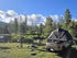 Roof Space 2 rooftop tent set up on car by the side of a lake.